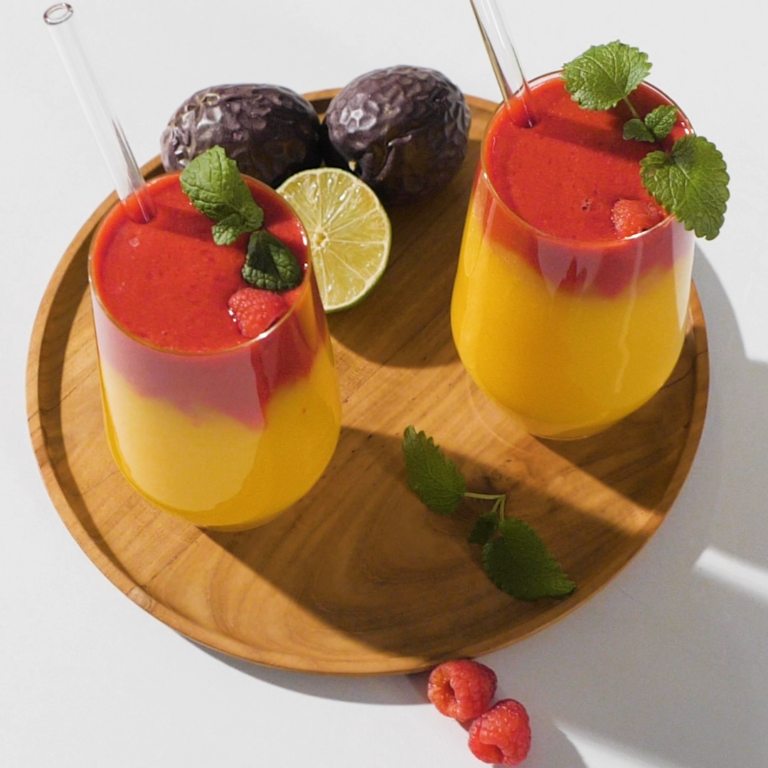 Perfekter Sommergenuss: Mango-Himbeer Mocktail für heiße Tage!